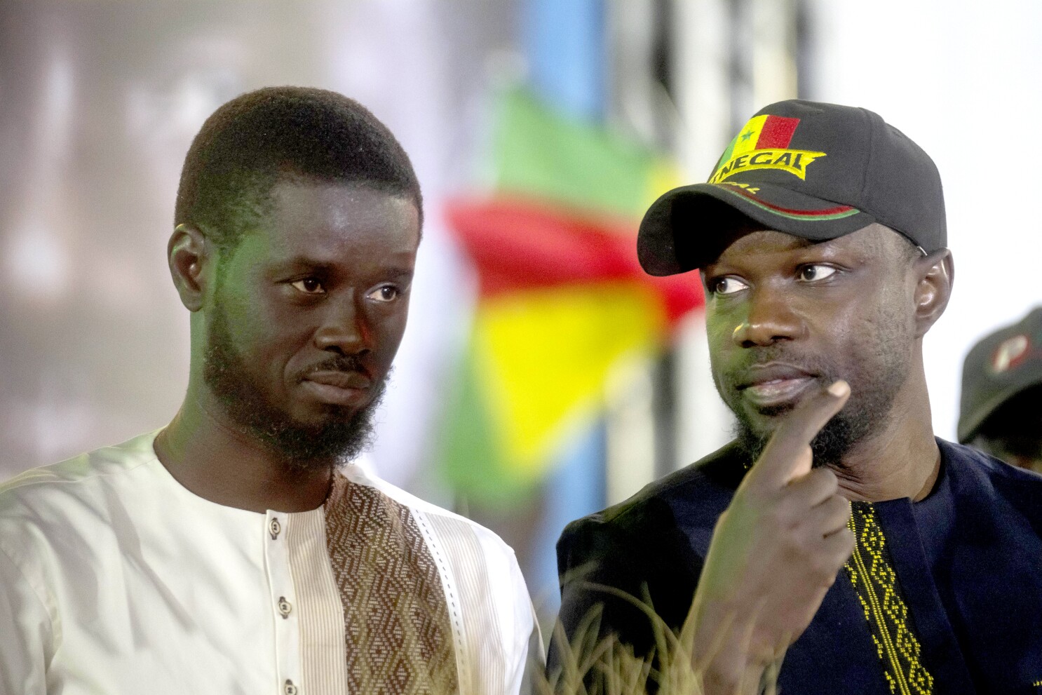 Presidential candidate Bassirou Diomaye Faye, left, and Senegal's top opposition leader, Ousmane Sonko, attend a final campaign rally ahead of the presidential elections in Mbour, Senegal, Friday, March 22, 2024. (AP Photo/Mosa'ab Elshamy)/XMS102/24083013725353//2403230132