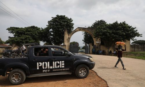 A police truck is stationed outside the University of Abuja Staff Quarters gate where unknown gunmen kidnapped people amongst whom were 2 of the university professors, lecturers and their family members in Abuja, Nigeria on November 2, 2021. - Gunmen abducted six people early on November 2, 2021 from a university near the international airport serving Nigerias capital Abuja, police said.
The dawn attack at the staff quarters of University of Abuja in Giri raised fears of safety around the Nnamdi Azikiwe International Airport, some 20 kilometres (12 miles) away. (Photo by Kola Sulaimon / AFP)